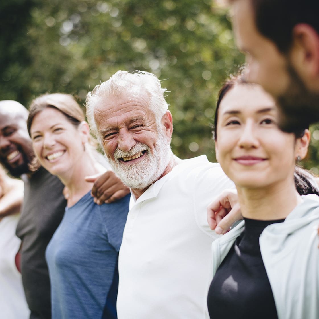 Happy diverse people together in the park