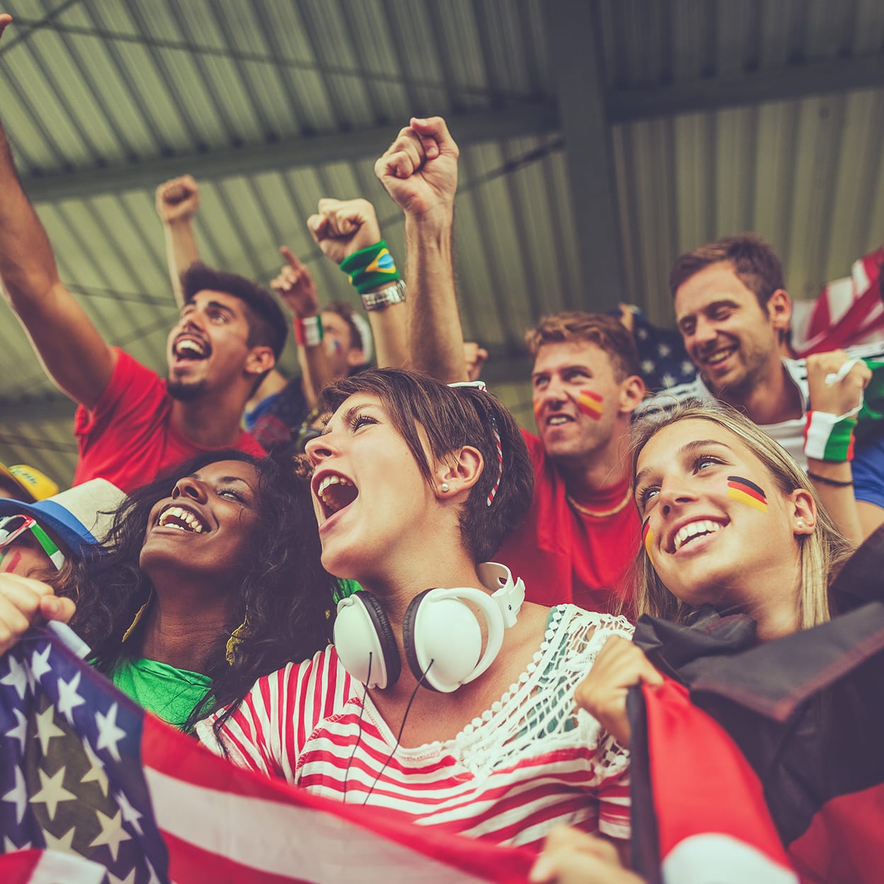 Group of different nations supporters together